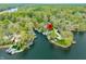 Overhead view of lakefront property with lush surroundings and private dock at 7456 Heather Ct, Nineveh, IN 46164