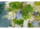 Aerial shot showcasing the home's roof and dock, nestled by the lake at 7456 Heather Ct, Nineveh, IN 46164