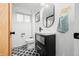 Bathroom features a sleek vanity, modern fixtures, and patterned tile floor at 7456 Heather Ct, Nineveh, IN 46164