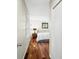 Cozy bedroom showcasing hardwood floors, neutral walls, and a comfortable bed with side tables at 7456 Heather Ct, Nineveh, IN 46164