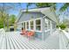 Deck with grill, orange chairs, and outdoor seating area at 7456 Heather Ct, Nineveh, IN 46164