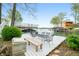 Beautiful lake view from the deck with outdoor seating, a boat slip, and serene waterfront views at 7456 Heather Ct, Nineveh, IN 46164