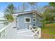 Exterior of home showing a side view with a deck and white railing at 7456 Heather Ct, Nineveh, IN 46164