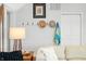 This coastal living room features an eclectic decor, hardwood floors, and a comfortable seating area that creates a cozy atmosphere at 7456 Heather Ct, Nineveh, IN 46164