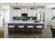 Open concept kitchen featuring a center island with seating and stainless steel appliances and modern lighting at 769 Rose Garden Way, Westfield, IN 46074