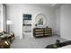 Bright main bedroom with a round mirror and ensuite bathroom in a modern home design at 769 Rose Garden Way, Westfield, IN 46074