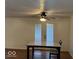 Cozy dining area features a modern table and chairs illuminated by a stylish ceiling fan with lights at 7833 Broadview Dr, Indianapolis, IN 46227
