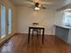 Dining area with hardwood floors, chandelier and windows allowing for ample natural light at 7833 Broadview Dr, Indianapolis, IN 46227
