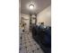 Functional laundry room with modern washer and dryer units plus updated patterned flooring at 7833 Broadview Dr, Indianapolis, IN 46227