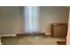 Bright bedroom with sheer curtains and vintage green carpet at 8200 E Desoto St, Muncie, IN 47303