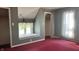 Cozy bedroom with built-in window seat, gray walls, and ample natural light at 8200 E Desoto St, Muncie, IN 47303