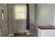 Neutral toned room showcases natural light through a window with soft curtains at 8200 E Desoto St, Muncie, IN 47303