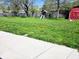 A beautiful backyard with a play structure at 8230 E 11Th St, Indianapolis, IN 46219