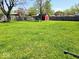 A spacious backyard with beautiful landscaping at 8230 E 11Th St, Indianapolis, IN 46219