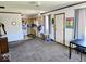 Open living area with dining area and access to the kitchen at 8230 E 11Th St, Indianapolis, IN 46219