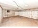 Unfinished basement with concrete flooring and cinderblock walls ready for customization at 830 N 16Th St, Elwood, IN 46036