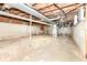 Unfinished basement with a dirt floor and exposed ductwork, ready for customization at 830 N 16Th St, Elwood, IN 46036