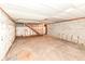 Spacious unfinished basement with exposed ceiling, concrete floor, and staircase at 830 N 16Th St, Elwood, IN 46036