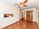 Dining area offering ample space, laminate floors, a ceiling fan, and a kitchen view at 830 N 16Th St, Elwood, IN 46036