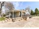 Home with a covered patio, porch, and accessibility ramp at 830 N 16Th St, Elwood, IN 46036