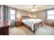 Spacious bedroom with gray walls, natural light, and a large bed for restful nights at 838 Deerfield Rd, Anderson, IN 46012