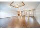 Open concept living room with vaulted ceilings and hard wood floors at 838 Deerfield Rd, Anderson, IN 46012