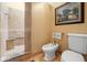Bathroom featuring tiled shower with bench, bidet, and toilet at 889 Cedar Wood Pl, Carmel, IN 46032