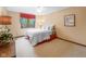 Comfortable bedroom featuring natural light, neutral decor, and a ceiling fan for a relaxing atmosphere at 889 Cedar Wood Pl, Carmel, IN 46032