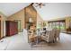 Inviting living room with a stone fireplace, vaulted ceilings, and comfortable furnishings at 889 Cedar Wood Pl, Carmel, IN 46032