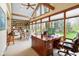 Spacious office with large windows, built in shelving and views of the backyard at 889 Cedar Wood Pl, Carmel, IN 46032