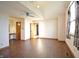 Spacious main bedroom with wood-look flooring, vaulted ceiling, a fan, and a large window at 8911 Country Walk Ct, Indianapolis, IN 46227