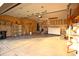 Organized garage space with ample storage, ideal for hobbies, projects, and vehicle parking at 8911 Country Walk Ct, Indianapolis, IN 46227