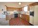 Bright kitchen featuring wood cabinets, stainless steel appliances, and tile flooring at 8911 Country Walk Ct, Indianapolis, IN 46227