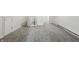 Finished attic space with neutral carpeting and white walls that could be used for storage at 911 W Washington Ave, Shelbyville, IN 46176