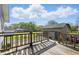 A wooden back deck perfect for entertaining or relaxing in your outdoor living space at 911 W Washington Ave, Shelbyville, IN 46176
