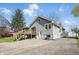 Charming single-Gathering home featuring a back deck and spacious backyard at 911 W Washington Ave, Shelbyville, IN 46176
