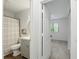 Hallway view of a bathroom and bedroom at 9309 Golden Woods Dr, Indianapolis, IN 46268