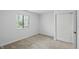 Neutral bedroom featuring carpet, a window and a closet at 9309 Golden Woods Dr, Indianapolis, IN 46268