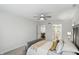 Neutral bedroom featuring carpet, ceiling fan and painted walls at 9309 Golden Woods Dr, Indianapolis, IN 46268
