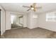 Bedroom includes ceiling fan, sliding glass doors, and a closet at 9535 E Michigan St, Indianapolis, IN 46229