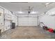 Spacious garage features high ceilings and plenty of storage space at 9814 E 17Th St, Indianapolis, IN 46229