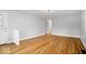 Spacious living room featuring hardwood floors, neutral walls, and a bright, airy atmosphere at 9814 E 17Th St, Indianapolis, IN 46229