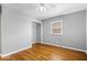 Bedroom featuring a ceiling fan and hardwood floors, offering a comfortable living space at 102 Florence Dr, Greenwood, IN 46143