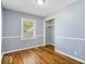 Cozy bedroom featuring beautiful hardwood floors and ample natural light at 102 Florence Dr, Greenwood, IN 46143