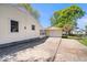 Property featuring a yellow exterior, attached garage and spacious driveway at 102 Florence Dr, Greenwood, IN 46143