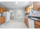 Functional kitchen featuring updated appliances, neutral countertops, and ample cabinet space at 102 Florence Dr, Greenwood, IN 46143