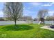 Large fenced backyard featuring a shed, playset, patio, and lush green lawn perfect for outdoor enjoyment at 10883 Balfour Dr, Noblesville, IN 46060