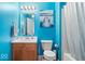 Bright bathroom featuring a vanity, commode and shower at 10883 Balfour Dr, Noblesville, IN 46060