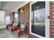 Inviting front porch with cozy seating, perfect for relaxing and enjoying the outdoors at 10883 Balfour Dr, Noblesville, IN 46060