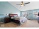 Inviting primary bedroom with vaulted ceiling, carpeted floor, and natural light from two windows at 10883 Balfour Dr, Noblesville, IN 46060